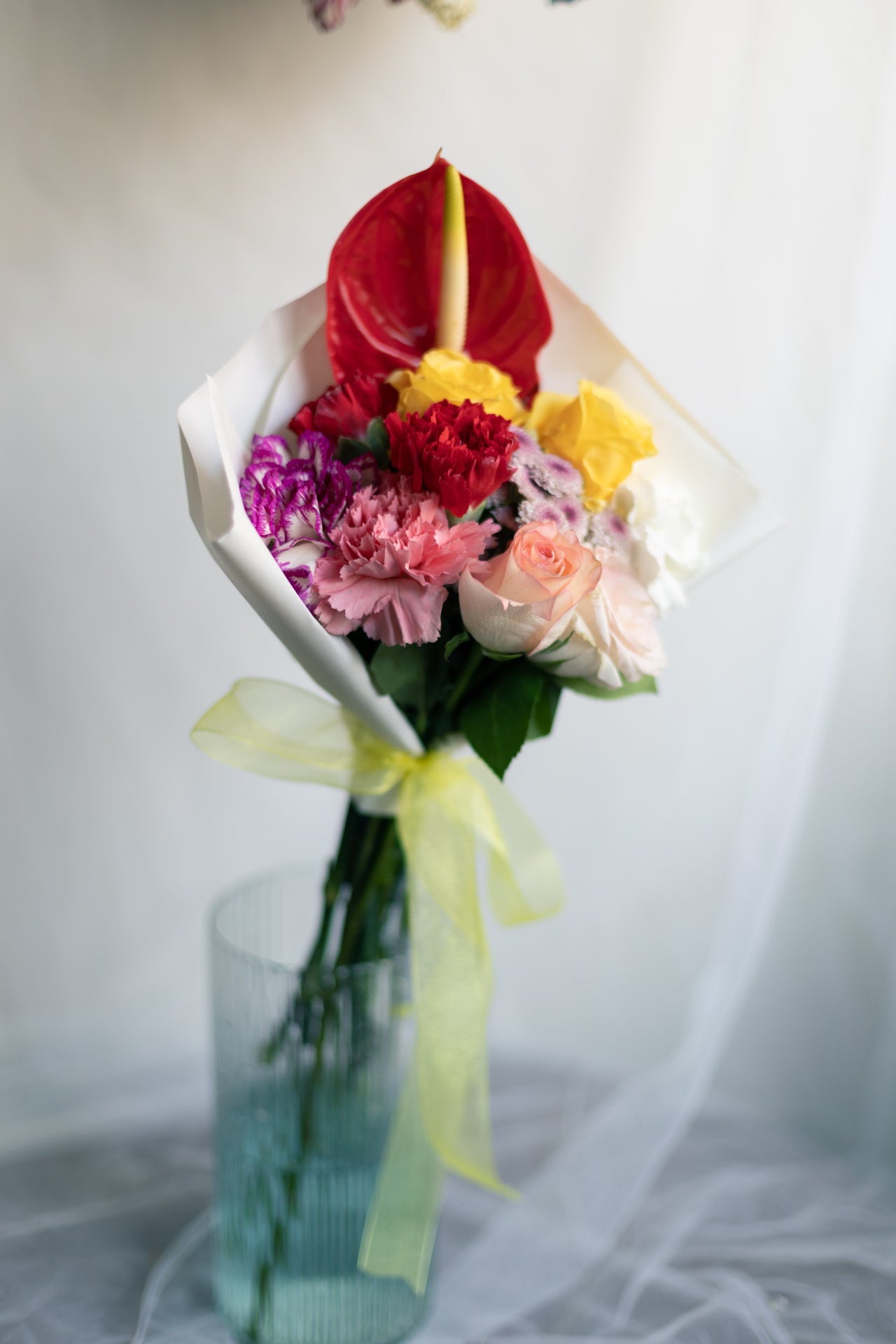Bold Heart – Roses, Carnations & Anthurium Bunch