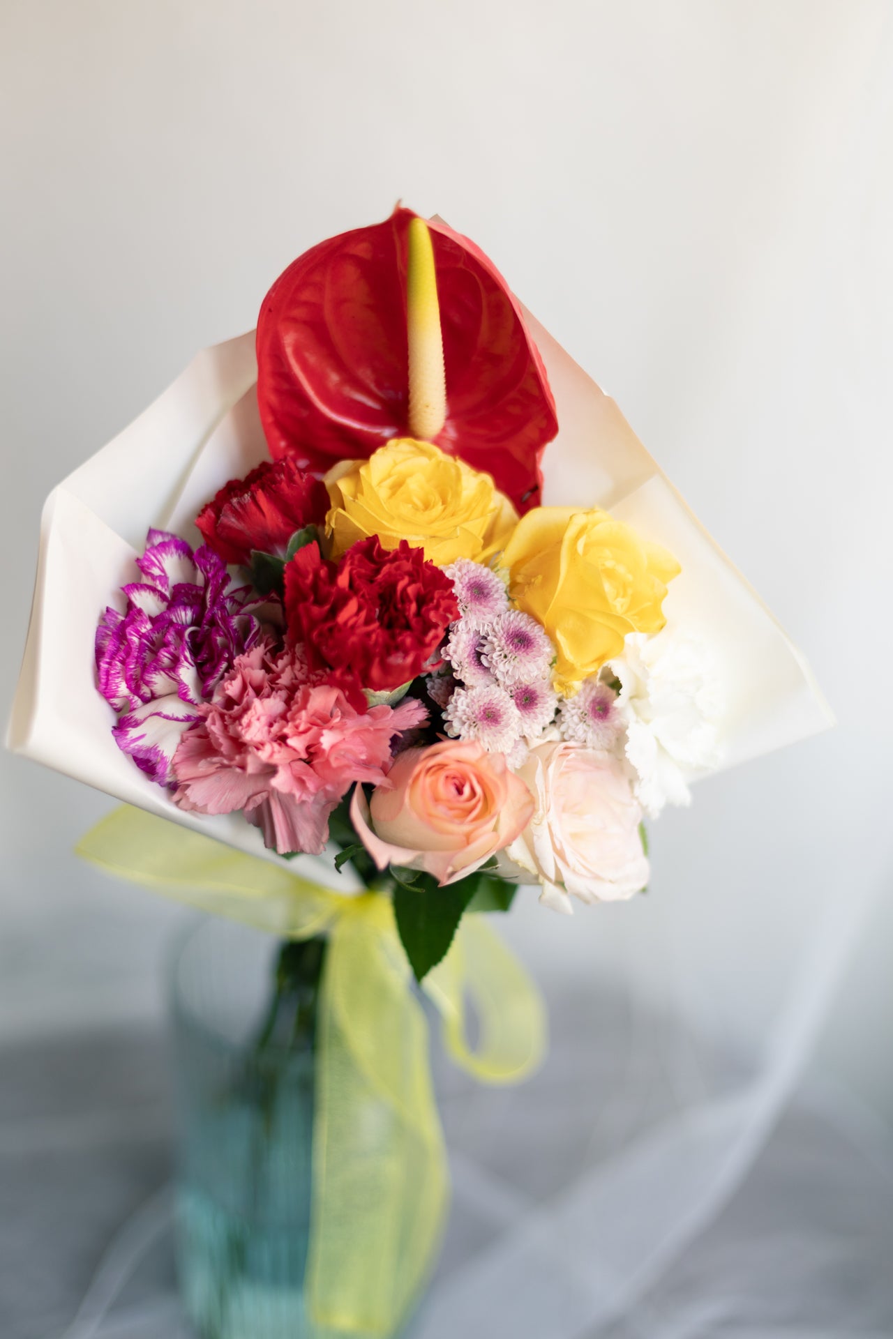 Bold Heart – Roses, Carnations & Anthurium Bunch