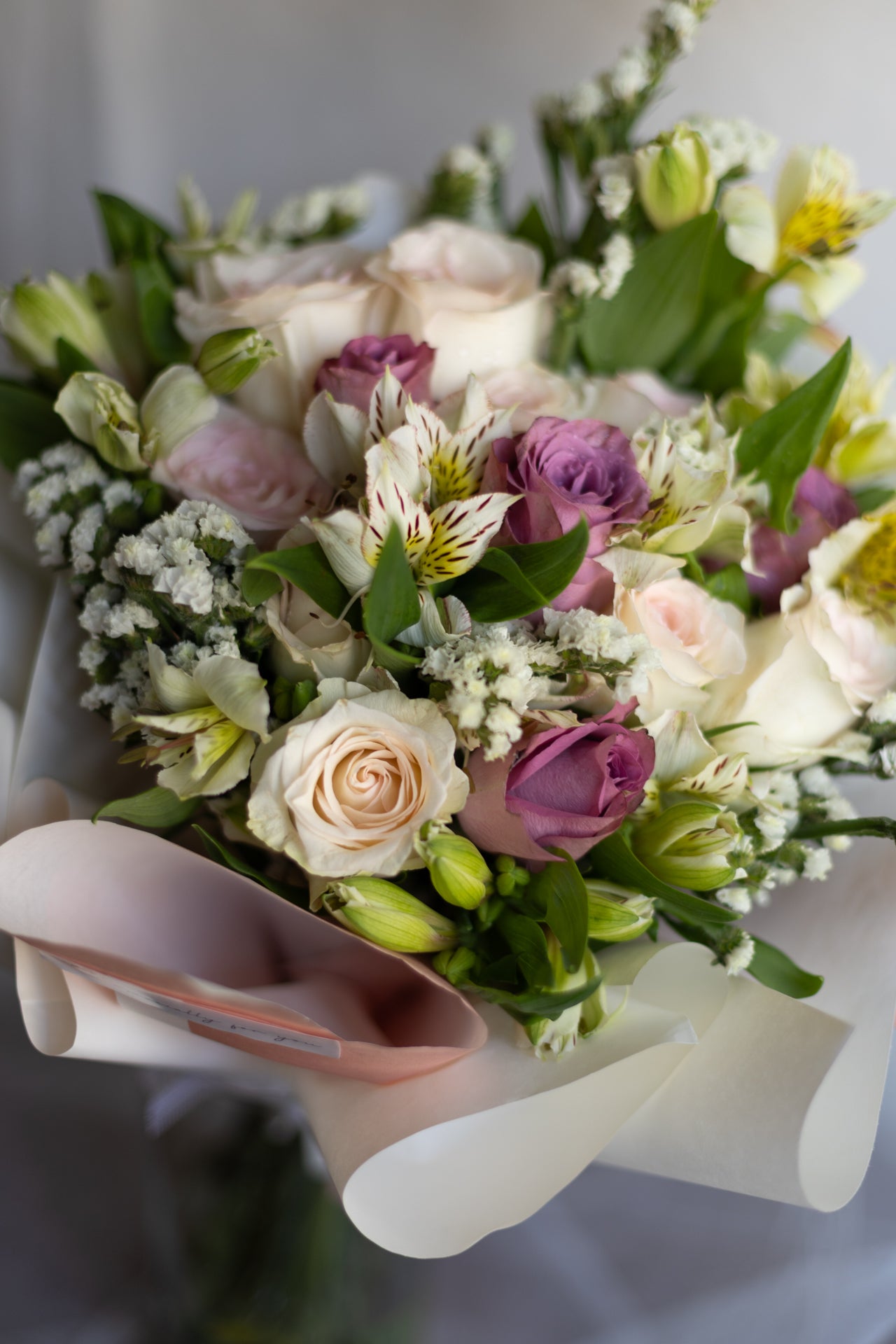 Whispers of Grace – Purple & White Roses
