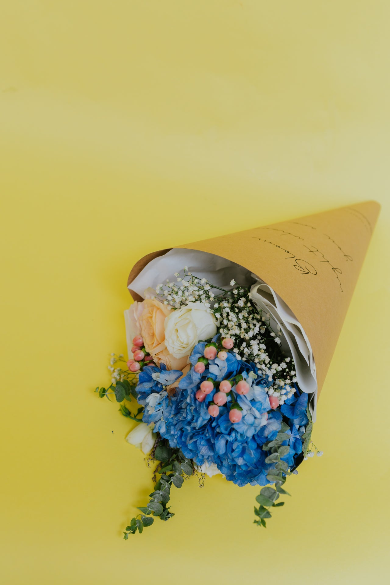 Whispers of Bliss: Blue Hydrangeas and Rosy Tones