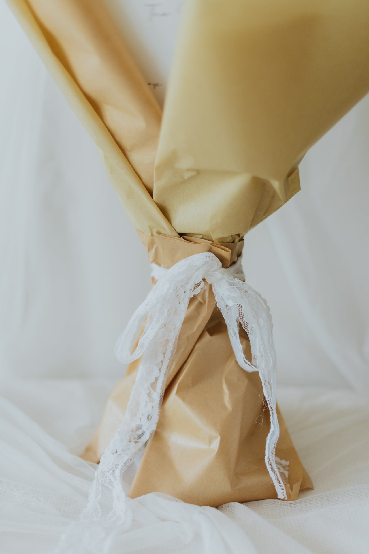 Sunlit Elegance: Yellow Tulips & White Flower Bunch