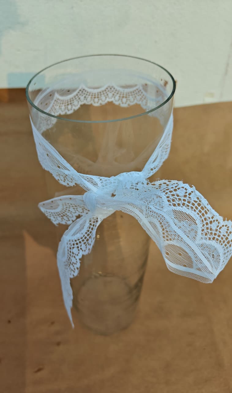 Ivory Fushion in Vase: Lilies and Rajnigandha ( Tuberose )