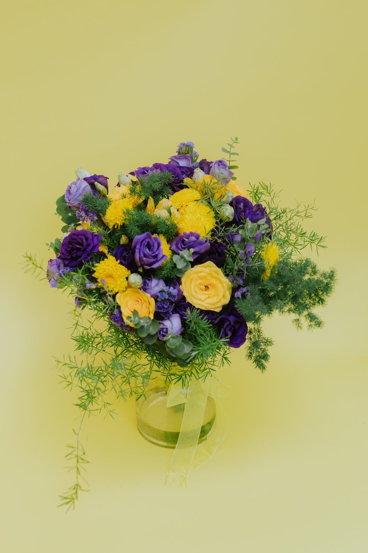Radiant Sunset: Yellow Flowers & Purple Eustoma Bouquet