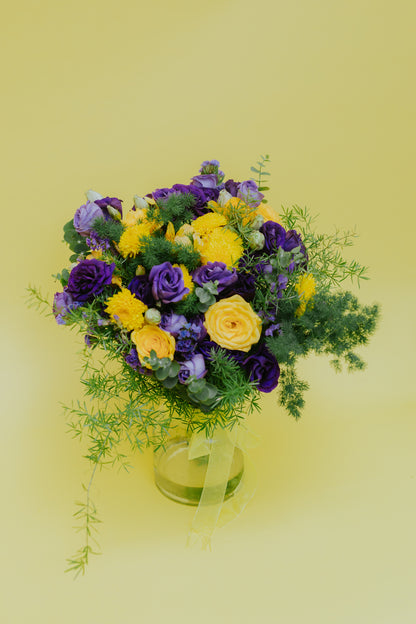 Radiant Sunset: Yellow Flowers & Purple Eustoma Bouquet