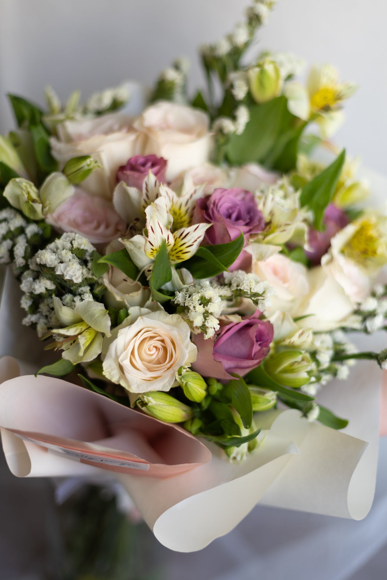 Whispers of Grace – Purple & White Roses
